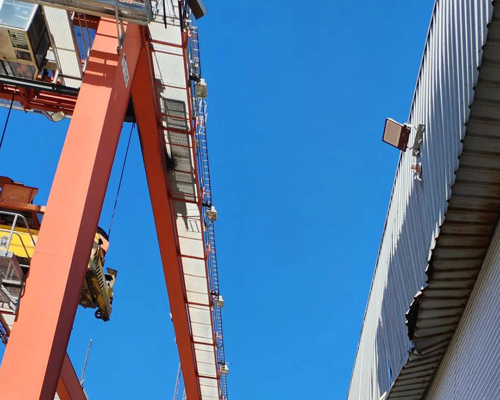 LED flood light installed above marine port crane loading area